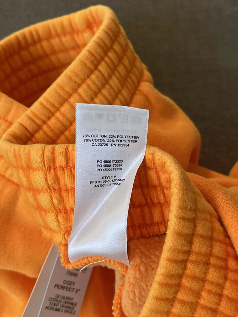 Aritzia Cozy Fleece orange shorts
